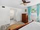 Bright bedroom with wood flooring and a view of the backyard at 1720 Hampton Ln, Clearwater, FL 33756