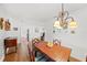 Bright dining room with a view into the kitchen at 1720 Hampton Ln, Clearwater, FL 33756