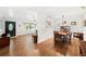 Dining area with wooden table and chairs, offering an open layout at 1720 Hampton Ln, Clearwater, FL 33756