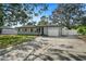 Newly renovated home with a large driveway and spacious yard at 1720 Hampton Ln, Clearwater, FL 33756