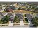 Aerial view of house and surrounding neighborhood at 18398 Aylesbury Ln, Land O Lakes, FL 34638