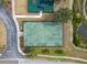 Basketball court with green surface and markings at 18398 Aylesbury Ln, Land O Lakes, FL 34638