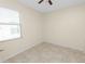 Bedroom with tile flooring and window with blinds at 18398 Aylesbury Ln, Land O Lakes, FL 34638