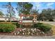 Wellington community entrance sign with landscaping at 18398 Aylesbury Ln, Land O Lakes, FL 34638