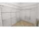 Large walk-in closet with wire shelving at 18398 Aylesbury Ln, Land O Lakes, FL 34638