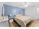 Bedroom with ceiling fan and tiled floors at 1950 58Th N Ave # 9, St Petersburg, FL 33714