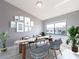 Dining room featuring stylish table decor and a large window view at 2372 Hanover Dr, Dunedin, FL 34698