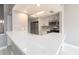 Bright kitchen featuring stainless steel appliances and white countertop at 2372 Hanover Dr, Dunedin, FL 34698