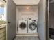 A laundry area featuring a full-sized Samsung washer and dryer ready to simplify chores at 2372 Hanover Dr, Dunedin, FL 34698