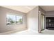 Living room featuring a sliding glass door with bright natural light and a fireplace at 2372 Hanover Dr, Dunedin, FL 34698