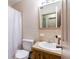 Clean bathroom with single sink vanity and shower/tub combo at 27103 Wakefield Dr, Brooksville, FL 34602