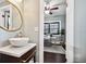 Stylish bathroom with vessel sink and view into home office at 2751 2Nd S Ave, St Petersburg, FL 33712