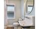 Bathroom with pedestal sink, shower, and updated fixtures at 2751 2Nd S Ave, St Petersburg, FL 33712