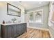 Bathroom with double vanity and plenty of natural light at 2751 2Nd S Ave, St Petersburg, FL 33712