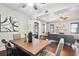 Bright dining room with wooden table and view into living room at 2751 2Nd S Ave, St Petersburg, FL 33712