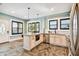 Kitchen with island, stainless steel appliances, and herringbone tile floor at 2751 2Nd S Ave, St Petersburg, FL 33712