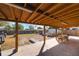 Covered patio with a concrete slab and wooden support beams at 2809 49Th N St, St Petersburg, FL 33710