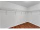 Spacious closet with wire shelving and wood flooring at 2826 Kavalier Dr, Palm Harbor, FL 34684