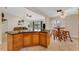 Open kitchen with large island and breakfast bar at 2826 Kavalier Dr, Palm Harbor, FL 34684