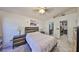 Bedroom with double bed, walk-in closet, and bathroom access at 305 Crayford Pl, Valrico, FL 33594