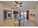 Bright dining room with glass table and seating for four at 305 Crayford Pl, Valrico, FL 33594