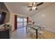 Bright dining room with glass table and seating for four at 305 Crayford Pl, Valrico, FL 33594