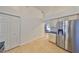 Kitchen with stainless steel refrigerator and ample counter space at 305 Crayford Pl, Valrico, FL 33594