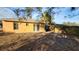 Backyard view of house, showing patio and surrounding area at 3101 E 23Rd Ave, Tampa, FL 33605