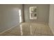 Spacious bedroom with tile floors and window at 3101 E 23Rd Ave, Tampa, FL 33605