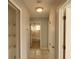 Hallway with tile floors and linen closet at 3101 E 23Rd Ave, Tampa, FL 33605