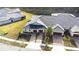 Aerial view of a house with grey roof and two car garage at 31349 Cabana Rye Ave, San Antonio, FL 33576