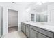 Modern bathroom with double vanity and walk-in shower at 31349 Cabana Rye Ave, San Antonio, FL 33576