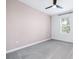 Bright bedroom with ceiling fan and neutral walls at 31349 Cabana Rye Ave, San Antonio, FL 33576