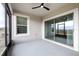 Covered screened patio with ceiling fan at 31349 Cabana Rye Ave, San Antonio, FL 33576