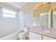 Bathroom with shower/tub combo and single vanity at 3440 Santa Rita Ln, Land O Lakes, FL 34639