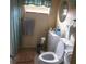 Clean bathroom with shower, toilet, and vanity at 35204 Ponderosa Rd, Zephyrhills, FL 33541