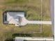 Bird's eye view of home, pool, and long driveway at 3571 Recurve Cir, Sarasota, FL 34240