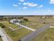 Aerial view of a single Gathering home on a large lot with white fence at 3571 Recurve Cir, Sarasota, FL 34240