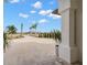 View from entryway of long driveway and landscape at 3571 Recurve Cir, Sarasota, FL 34240