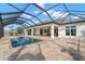 Large covered patio, pool, and spa. Perfect for entertaining at 3571 Recurve Cir, Sarasota, FL 34240