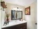 Clean bathroom with updated vanity and mirror at 3710 41St S Way # C, St Petersburg, FL 33711