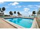 Community pool area with gazebo and lounge chairs at 3710 41St S Way # C, St Petersburg, FL 33711