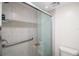 Clean condo shower with grab bar and sliding glass door at 3710 41St S Way # C, St Petersburg, FL 33711