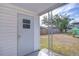 Home exterior with storage shed and yard at 37418 Hammond Dr, Zephyrhills, FL 33541