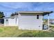 Side view of mobile home and shed at 37418 Hammond Dr, Zephyrhills, FL 33541