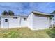 Rear view of mobile home and yard at 37418 Hammond Dr, Zephyrhills, FL 33541