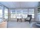 Sunroom with ample seating and natural light at 37418 Hammond Dr, Zephyrhills, FL 33541