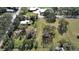 Aerial view of property showing home, outbuildings, and yard at 4001 Keene Rd, Plant City, FL 33565