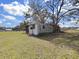 Aerial view of the property showing a large yard and outbuildings at 4001 Keene Rd, Plant City, FL 33565