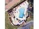 Community pool and surrounding recreational areas are shown from an aerial perspective at 407 Lake Point Ct # 4E, Sun City Center, FL 33573